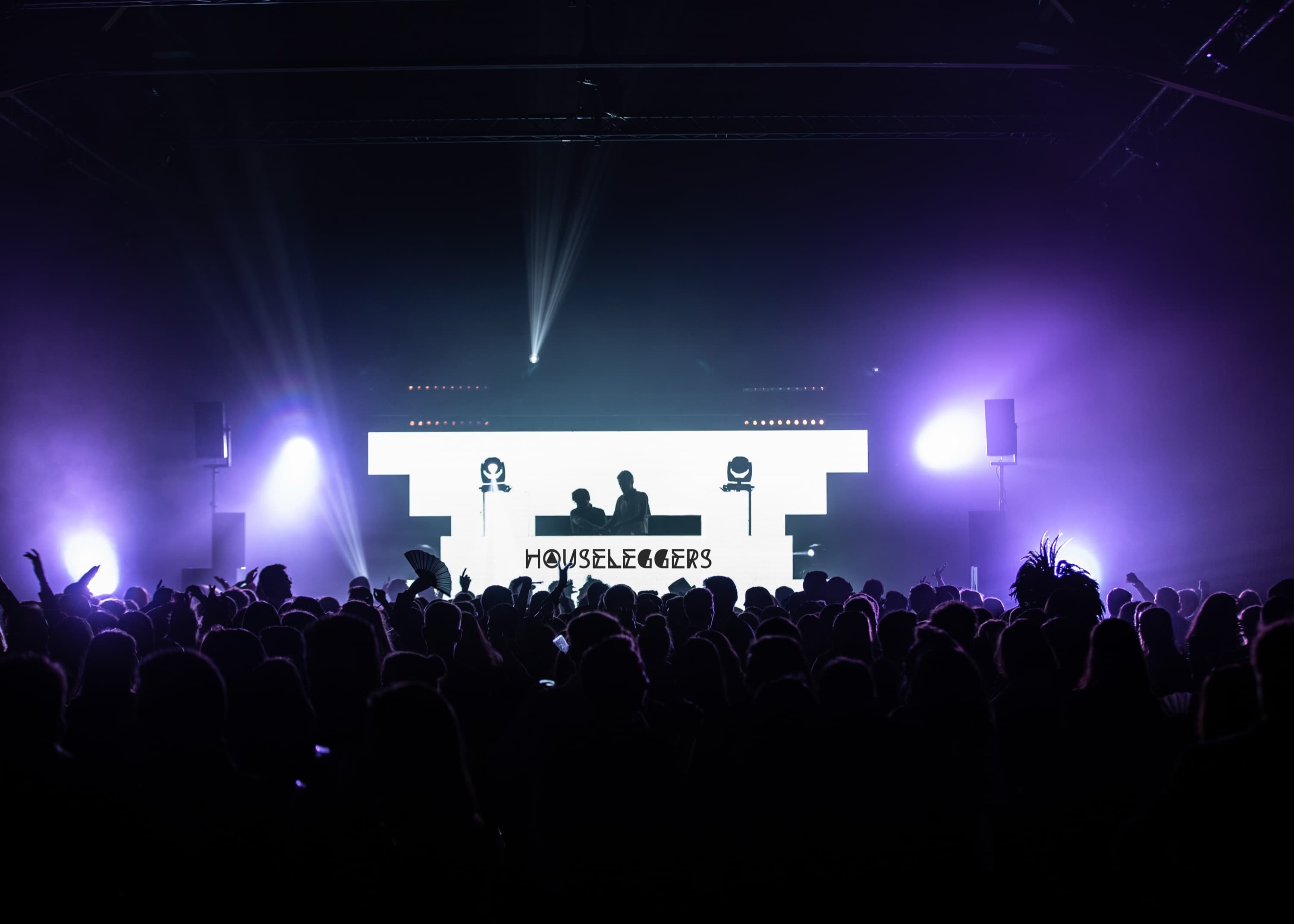 Houseleggers on a festival stage with an LED wall facing the crowd